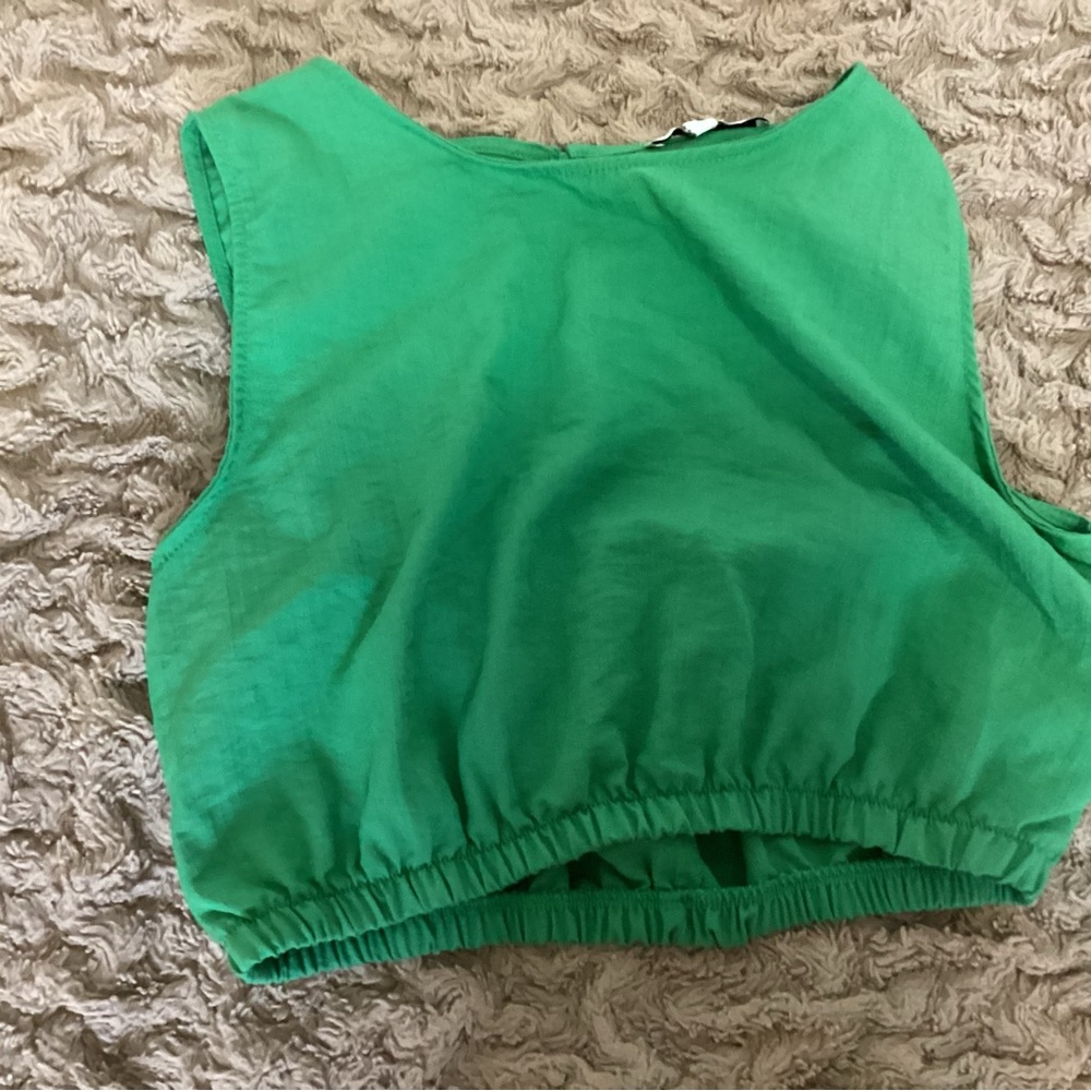 HYFVE girls green shirt with a button in the back 
Size L